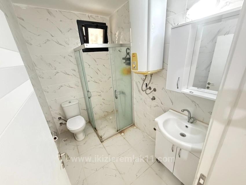 1+1 Erdgeschosswohnung In Ürkmez, 100 Meter Vom Meer Entfernt, Von İkizler.