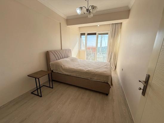 Neue 3+1-wohnung Mit Meer- Und Naturblick Im Zentrum Von Gumuldur Zu Verkaufen