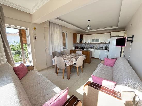 Neue 3+1-wohnung Mit Meer- Und Naturblick Im Zentrum Von Gumuldur Zu Verkaufen