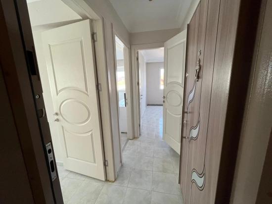 Großzügige 2+1-Zimmer-Wohnung Im Mittleren Stockwerk Im Zentrum Von Ürkmez, In Meeresnähe, Zu Verkaufen.