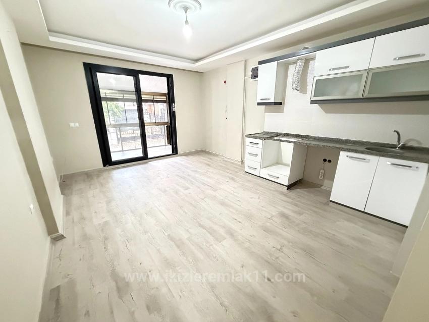 1+1 Ground Floor Apartment In Ürkmez, 100 Meters From The Sea, From İkizler.