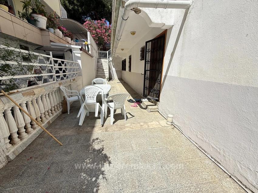3+1 Garden Apartment For Sale In Ürkmez, 250 Meters From The Sea, Affordable Price