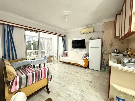 Seferihisar Ürkmez In the centre for sale 2+1 apartment 200 metres to the sea