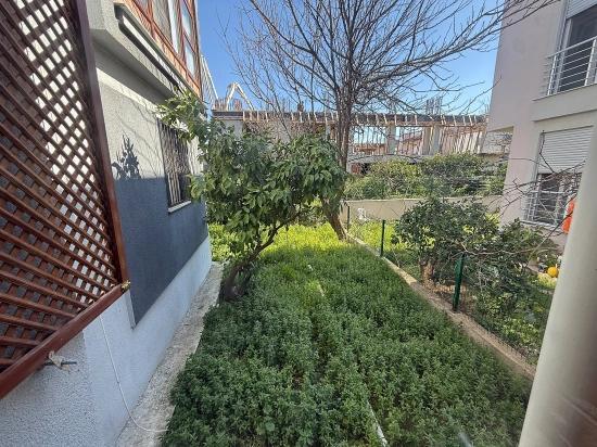 Ground Floor 2+1 Apartment With Garden For Sale In Seferihisar Ürkmez Center.