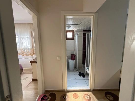 Ground Floor 2+1 Apartment With Garden For Sale In Seferihisar Ürkmez Center.