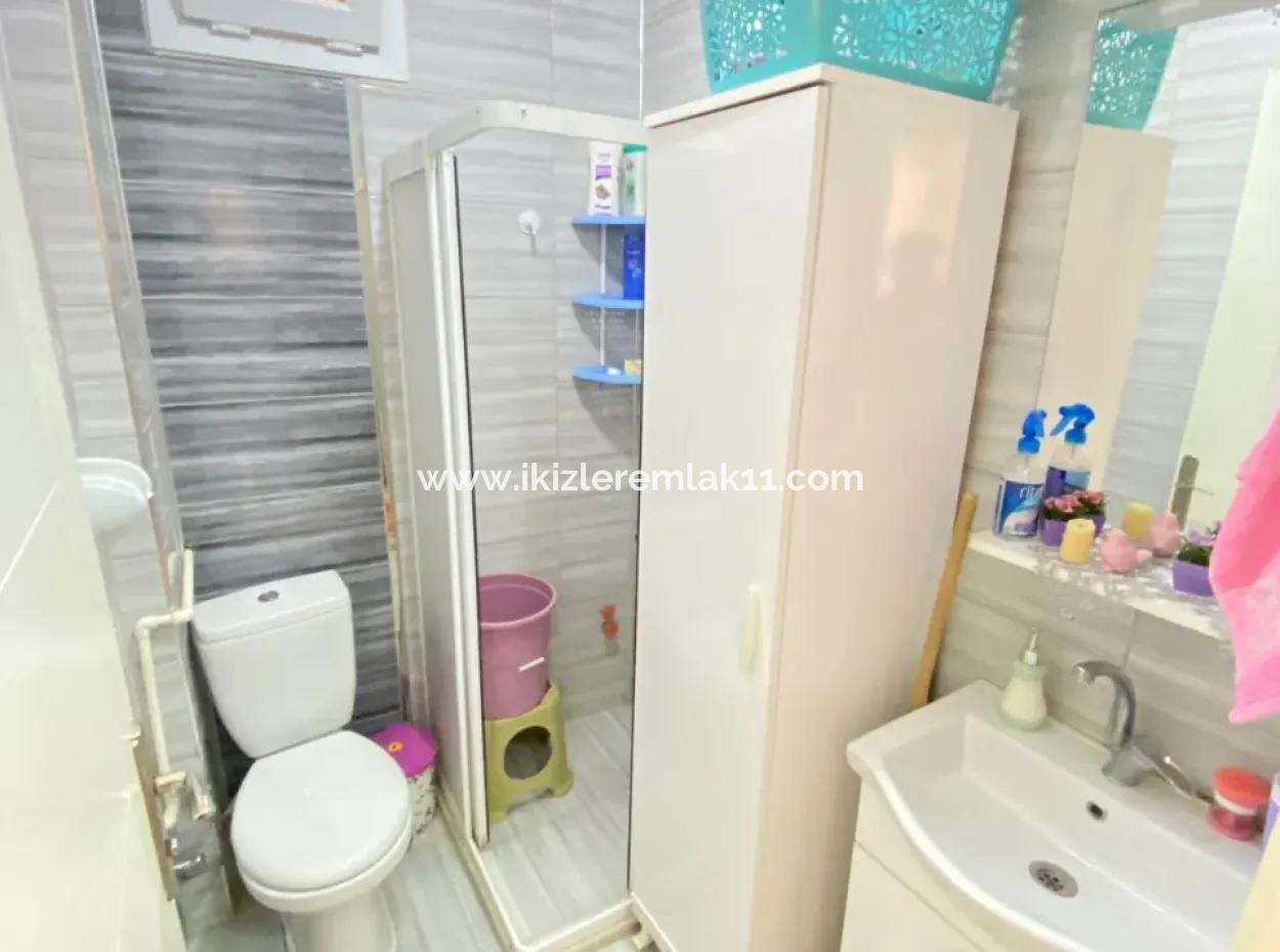 2 1 Apartment With Ground Floor Garden For Sale In Seferihisar Ürkmez Center