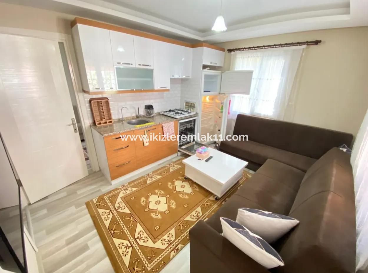 2 1 Apartment With Ground Floor Garden For Sale In Seferihisar Ürkmez Center