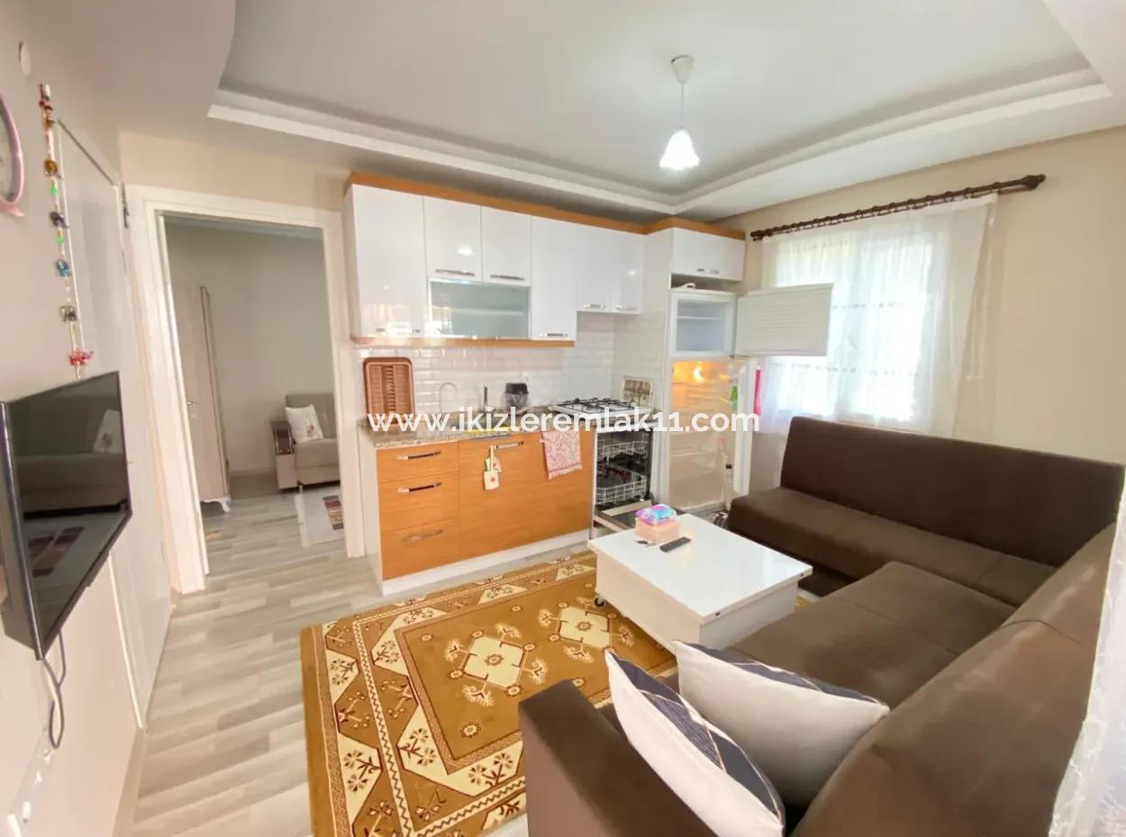 2 1 Apartment With Ground Floor Garden For Sale In Seferihisar Ürkmez Center