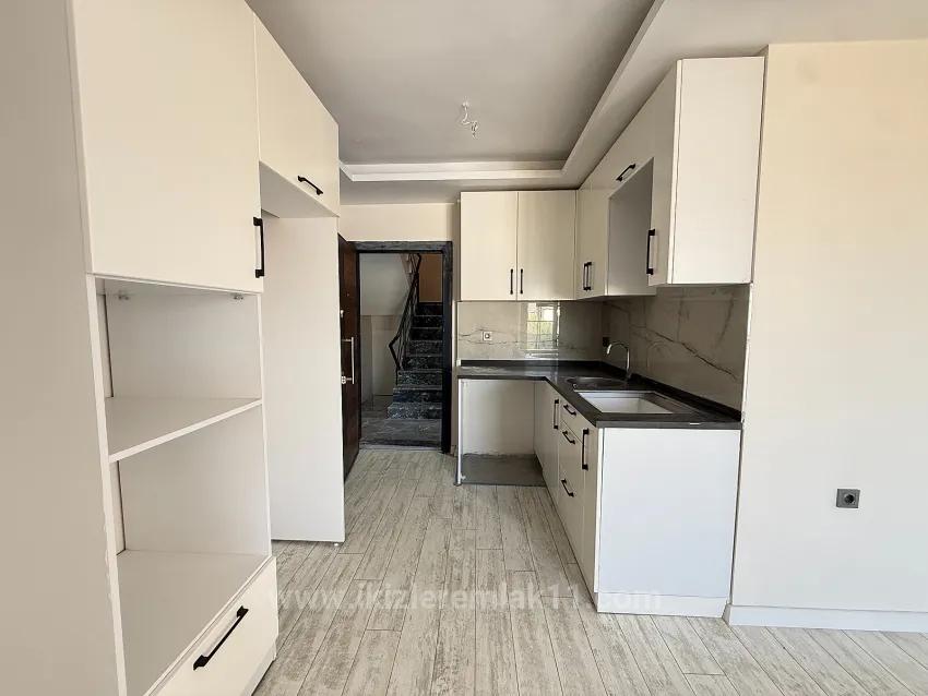 В Сеферихисаре Doğanbey Продается 1+1 Квартира На Стороне Моря Продается Квартира