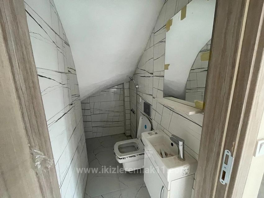 Роскошная Вилла 3+1 На Продажу В Районе Сеферихисар-Доганбей, Просторное Место, Очень Близко К Морю