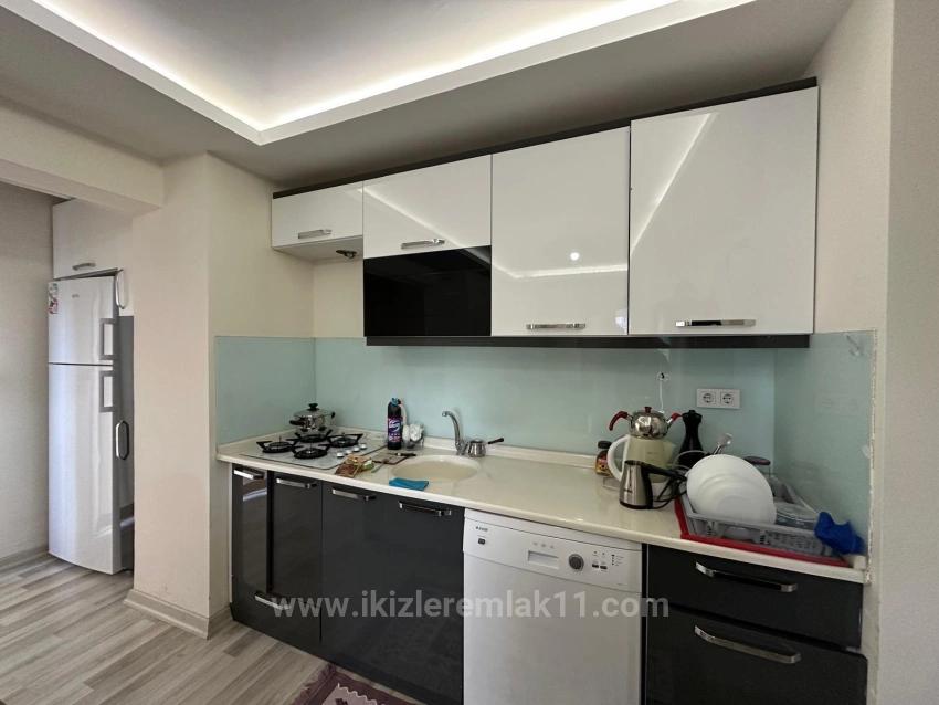 Продается Квартира 2+1 На Первом Этаже В Районе Сеферихисар-Доганбей, В 200 М От Моря