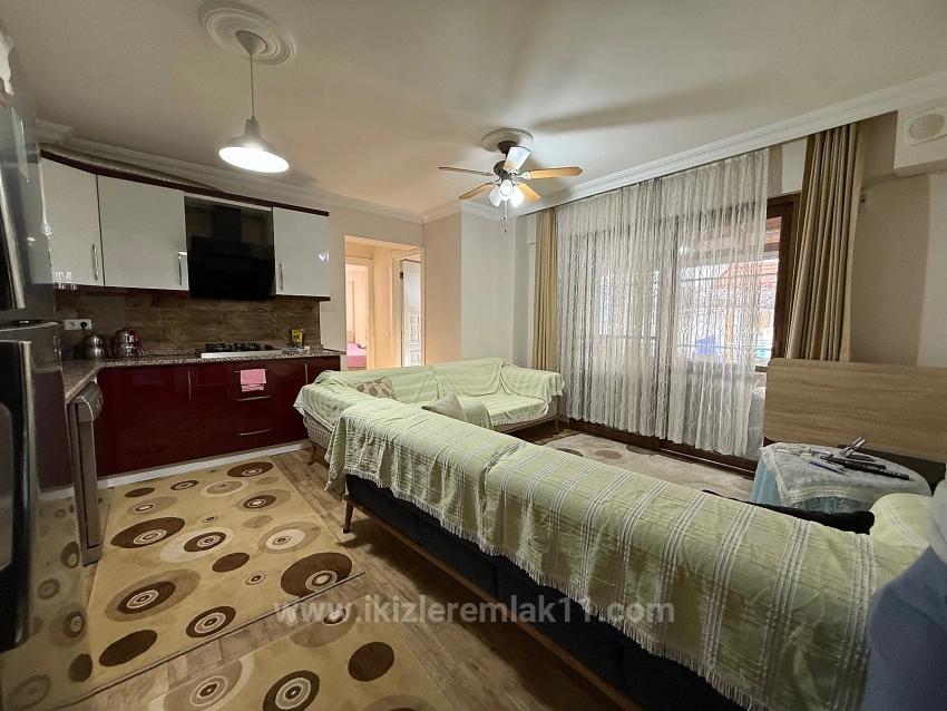 Квартира 2+1 На Первом Этаже С Садом На Продажу В Центре Сеферихисар Юрмез.