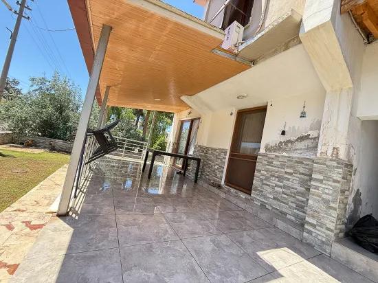 В Сефериисаре Doğanbey Продается 3+1 Вилла С Садом В 50м От Моря