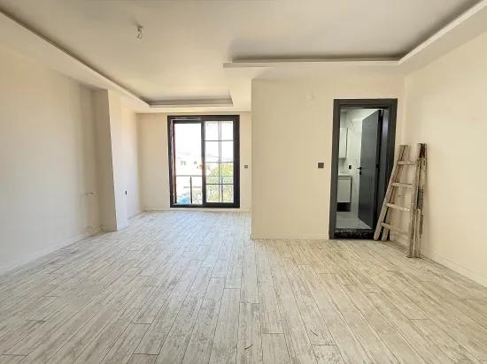 В Сеферихисаре Doğanbey Продается 1+1 Квартира На Стороне Моря Продается Квартира