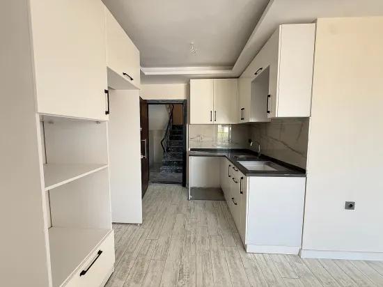 В Сеферихисаре Doğanbey Продается 1+1 Квартира На Стороне Моря Продается Квартира