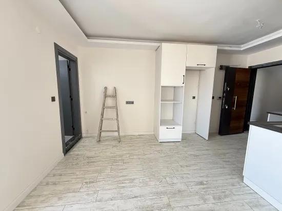 В Сеферихисаре Doğanbey Продается 1+1 Квартира На Стороне Моря Продается Квартира