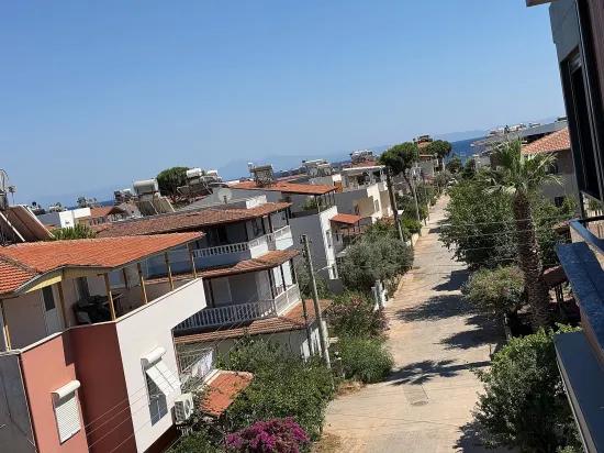 В Сеферихисаре Doğanbey Продается 1+1 Квартира На Стороне Моря Продается Квартира