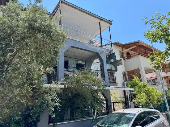 В Doğanbey Продажа Средний Этаж 2+1 Морская Сторона 70 Метр² Квартира
