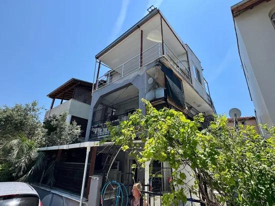 В Doğanbey Продажа Средний Этаж 2+1 Морская Сторона 70 Метр² Квартира
