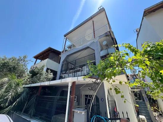 В Doğanbey Продажа Средний Этаж 2+1 Морская Сторона 70 Метр² Квартира