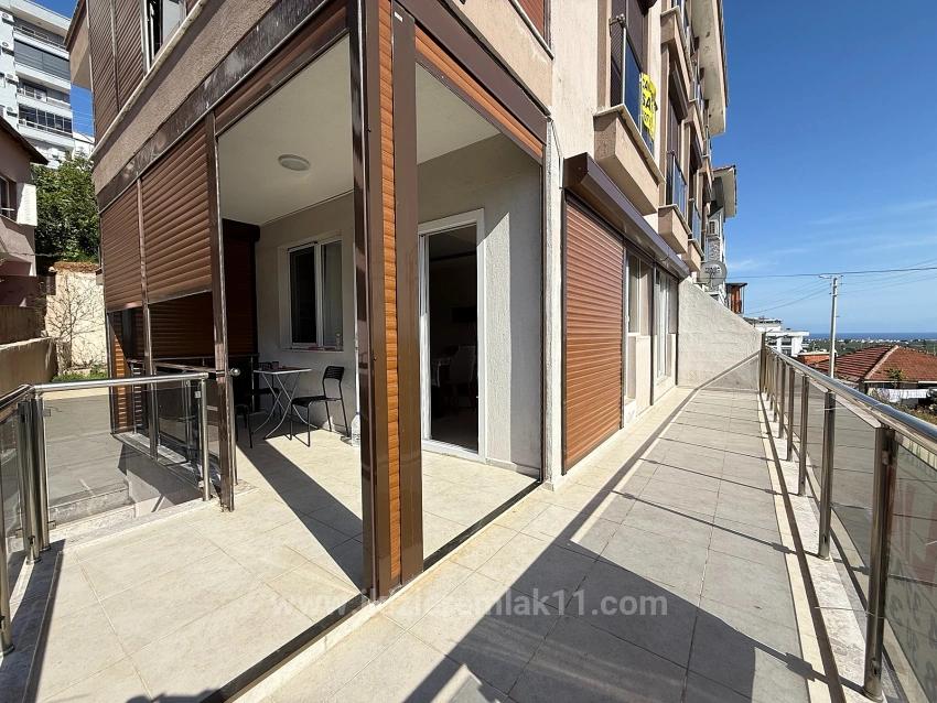 Gümüldür Merkezde Satılık 3 + 1 Deniz Ve Doğa Manzarali Yeni Daire