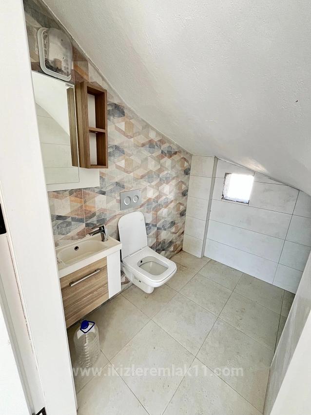 Ürkmez Doğanbey'de Satılık Sıfır Tek Müstakil 3+1 Geniş Villa