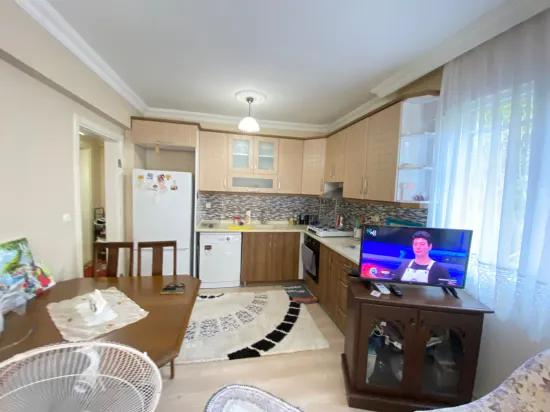 Ürkmez Merkez'de giriş katı 2+1 full eşyalı daire