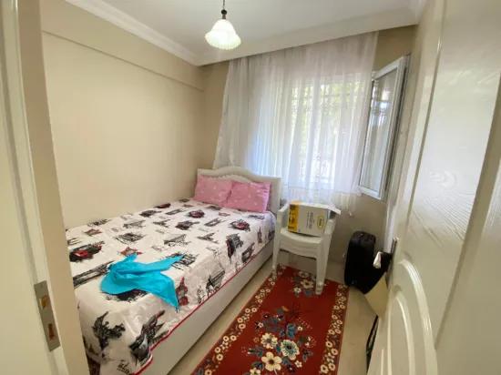 Ürkmez merkezde giriş katı 2 + 1 full eşyalı daire