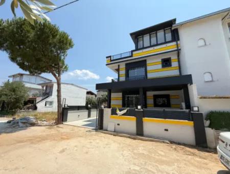 Seferihisar Doğanbey'de Satılık 3+1 Müstakil Sıfır Geniş Bahçeli Villa