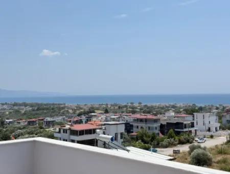 Seferihisar Doğanbey'de Satılık Deniz Manzaralı Bahçeli 3+1 Sıfır Villa