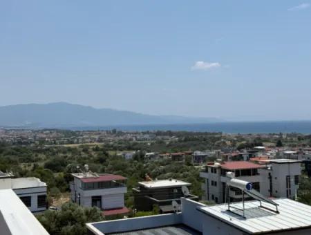 Seferihisar Doğanbey'de Satılık Deniz Manzaralı Bahçeli 3+1 Sıfır Villa